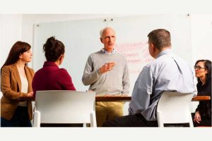 team at stanley law discusses strategy on a personal injury case