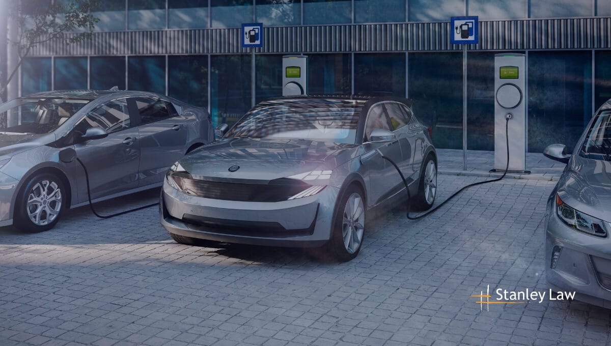 An electric car charging - Stanley Law Office
