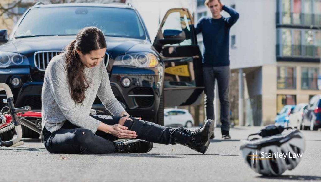 A lady hit by a car while riding ebike- Stanley Law Office