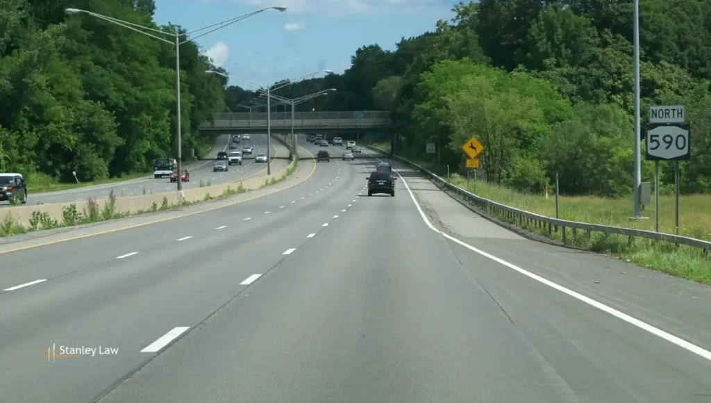 Two Vehicles Damaged in Crash on I-590