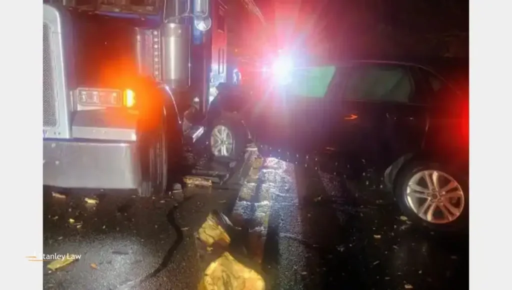 Car, tractor trailer involved in accident on 220