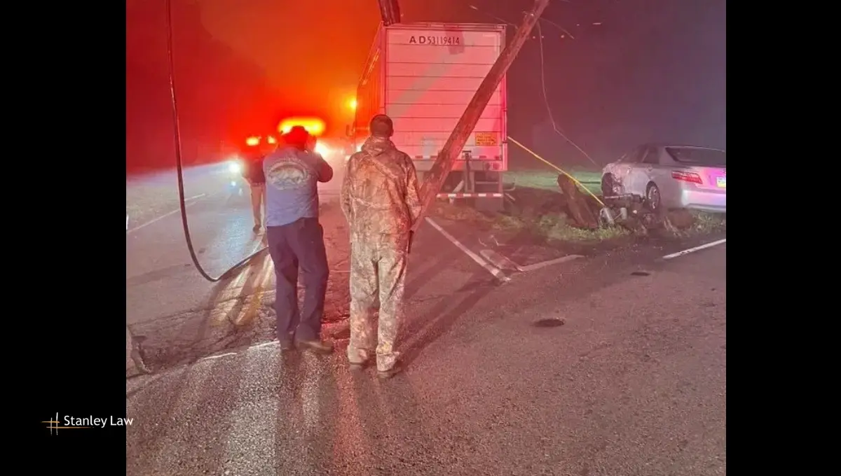 Crash between tractor-trailer, car