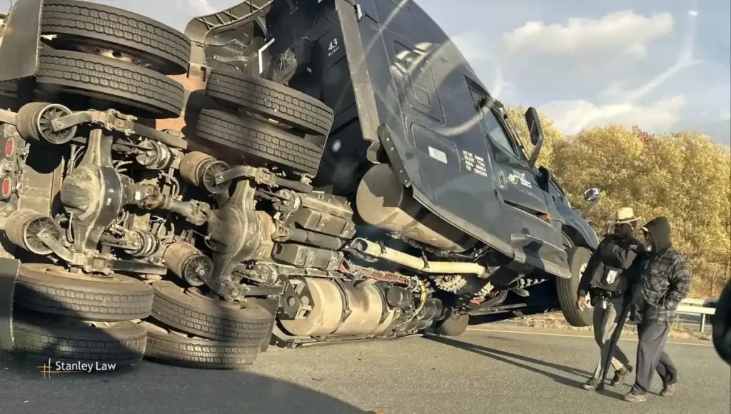 Tractor-trailer overturns near I-87