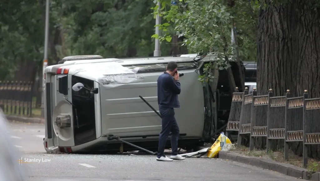 Two Rescued After Car Overturns