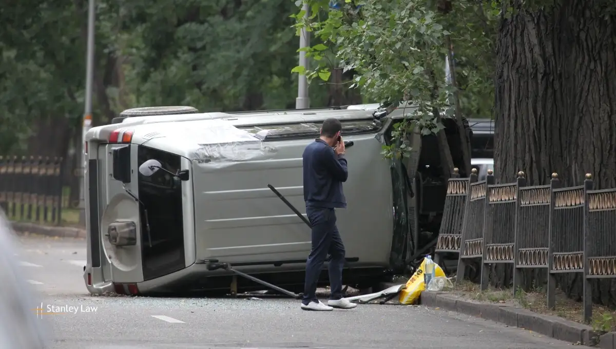 Two Rescued After Car Overturns